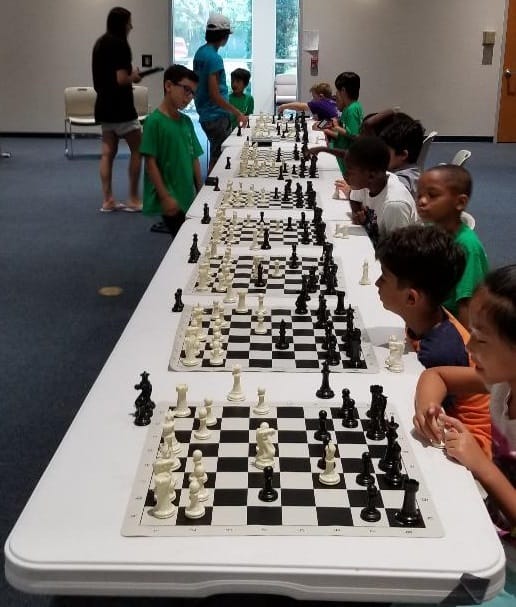 Kids Learning Chess at Summer Camp